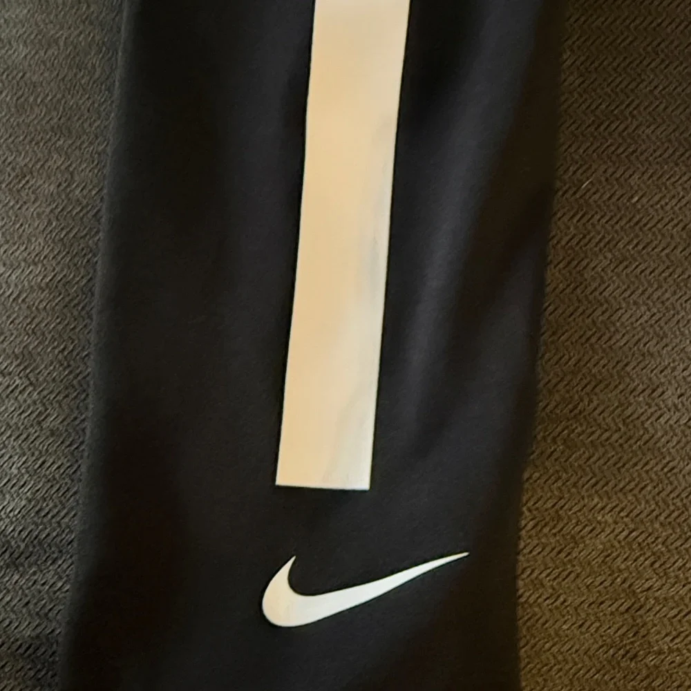 Nike Black Sleeve with White Stripe